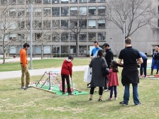 kids play mini-golf