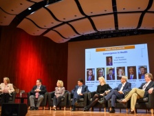 a panel of scientists on stage