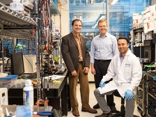 three researchers in a lab